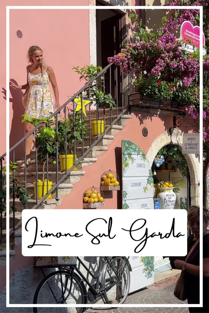 Girl walking down stairs, pink staircase, colourful flowers.